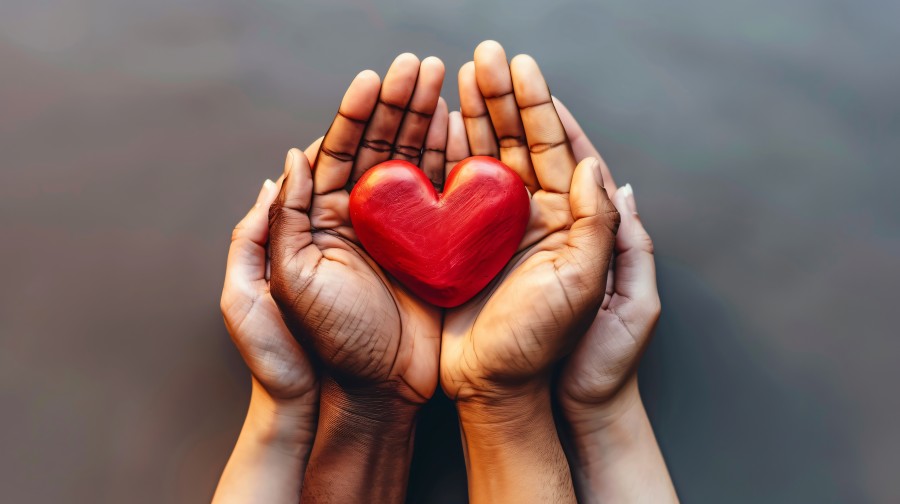 view-hands-holding-red-heart-represent-affection (1)